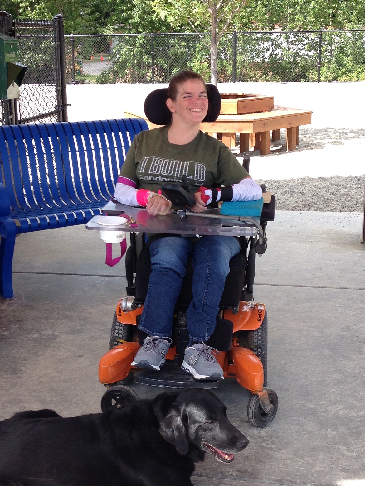 (Photo by MARY MALONE)
Caitlin Bayles was excited last Thursday to be the first person in a wheelchair to try out Ponderay&#146;s first off-leash, fully accessible ADA dog park, along with her retired service dog Diesel. The park opened last week, and a public grand opening will be held from 3-6 p.m. Sunday at the park, located next to Panhandle Animal Shelter on Kootenai Cutoff Road.