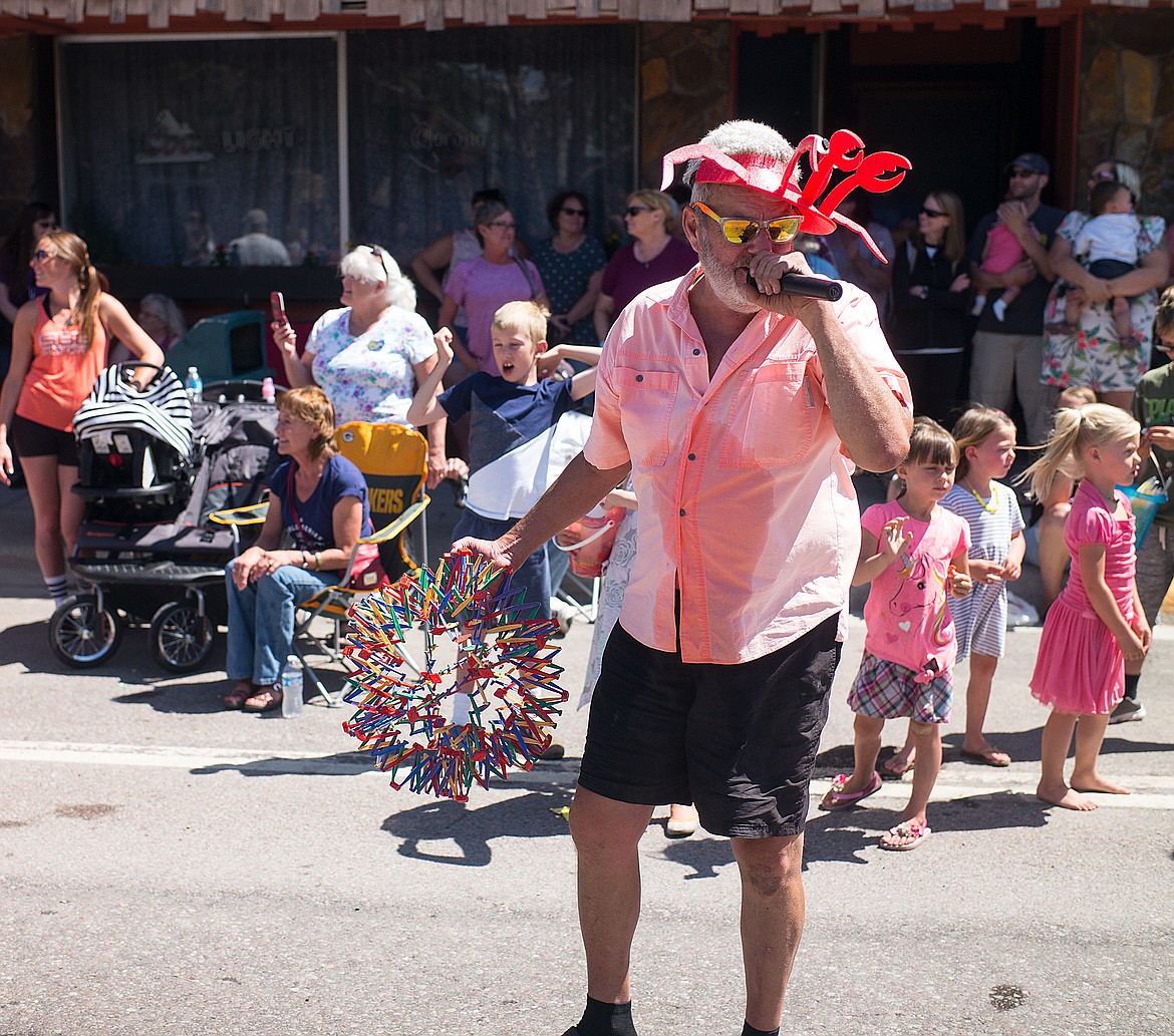 Karl Skindingsrude emcees the parade.