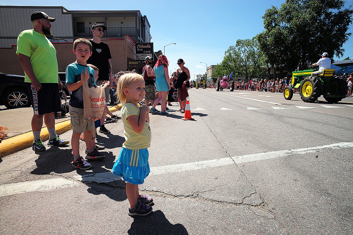 Alesia Mathison watches the parade go by.