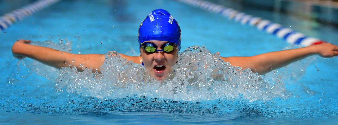 Norah Bagley swims the butterfly at a recent meet. Bagley and the Columbia Falls swim team took second in Chester over the weekend despite only having 32 swimmers in action. (Jeremy Weber photo)