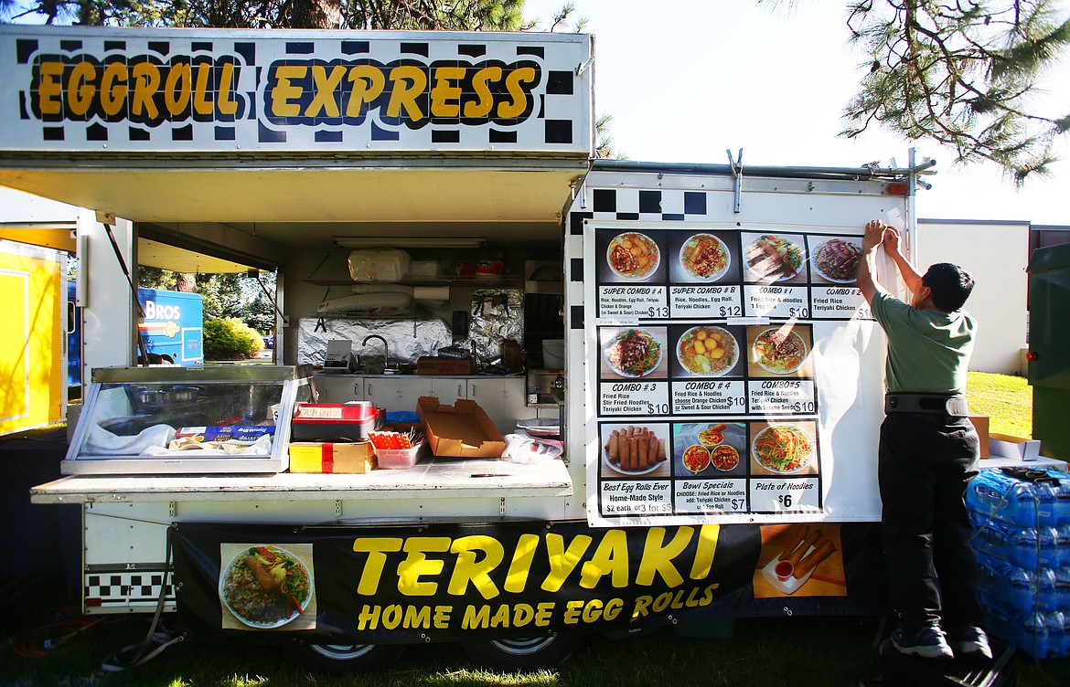 Chu Vue prepares his Eggroll Express food truck Friday prior to Rathdrum Days this weekend. (LOREN BENOIT/Press)