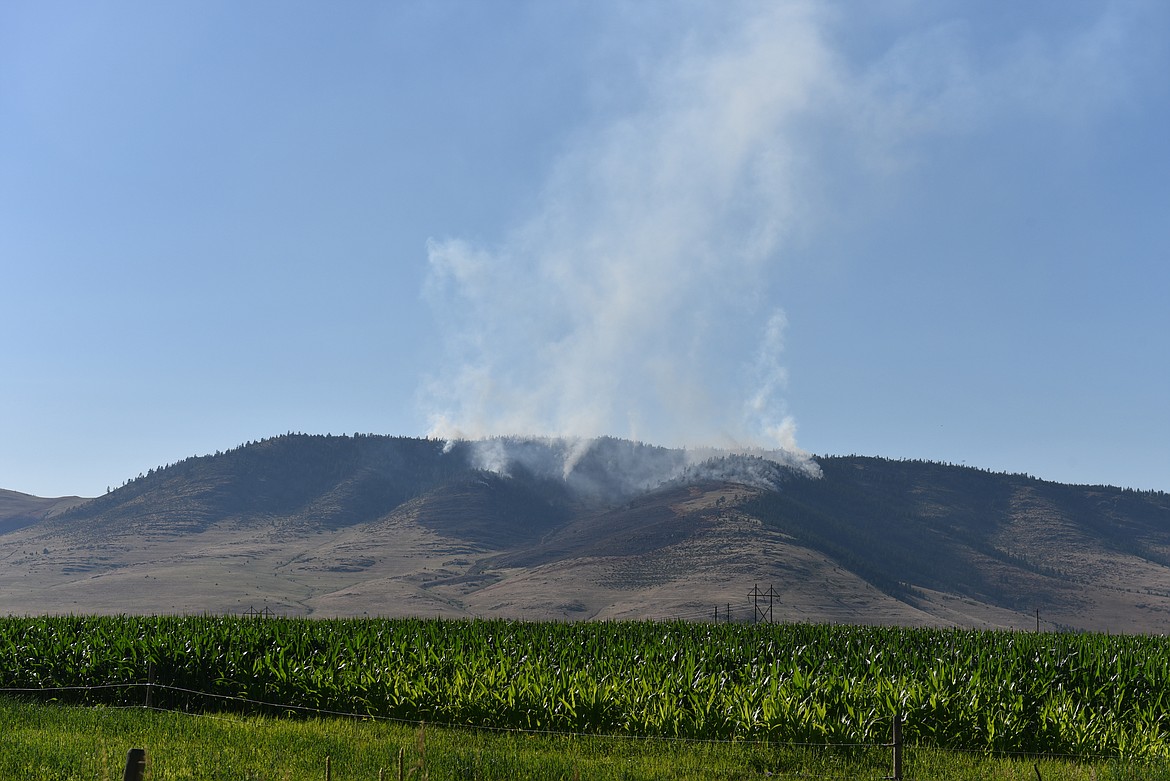 A LARGE burnout operation will take place in an attempt to contain the lightning-caused Moss Ranch Fire 14 miles southwest of Ronan, on the Flathead Indian Reservation. 160 crew members are involved in the operation, which is scheduled to start at 9 a.m. Friday will include A 1 Type II Initial Attack Crew, 2 Type II Crews, Air attack, 1 Type 3 helicopter, 3 S.E.A.T.&#146;s, four dozers, six skidgens, and one ambulance and four water tenders assigned to the fire. (photo by Carolyn Hidy)