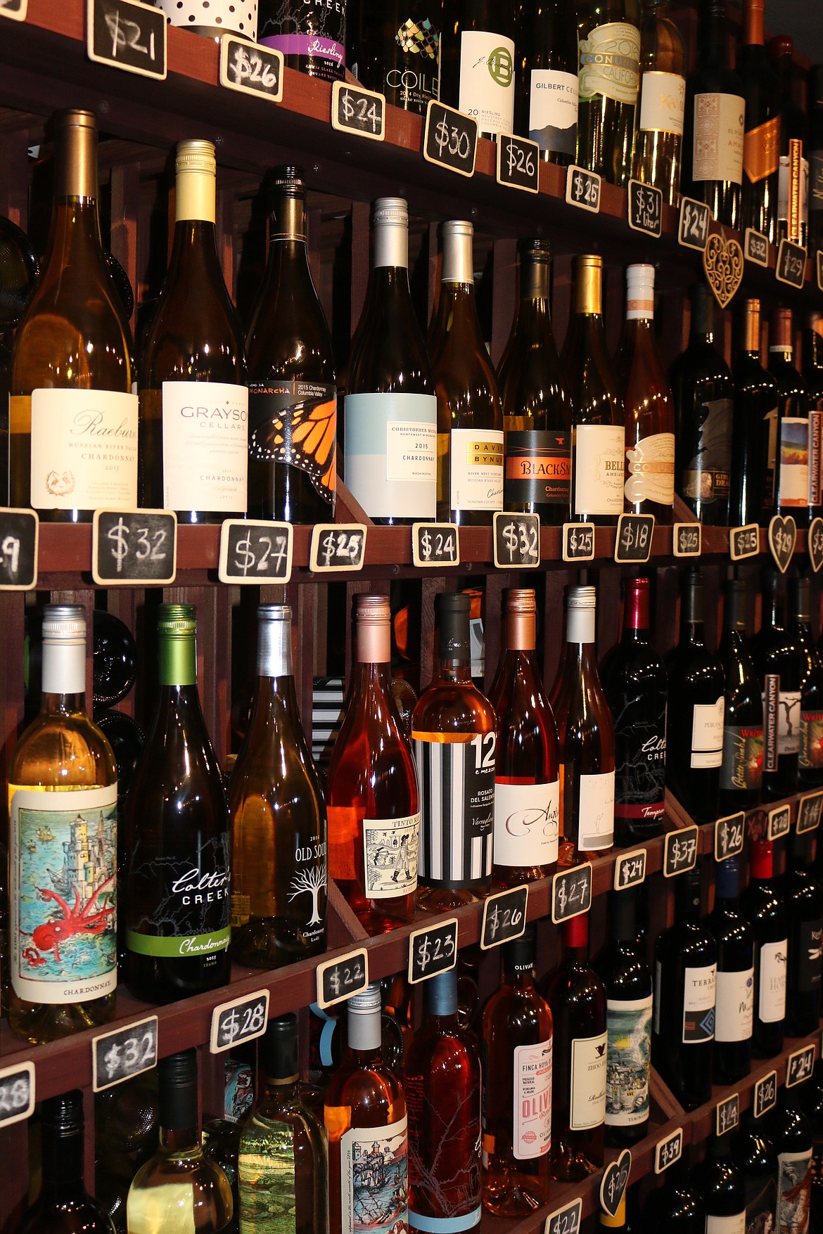 Photo by MANDI BATEMAN
A wide selection of wines line the walls of Heart Rock Wines, winner of the 2019 Best of Boundary County Best Wine category.