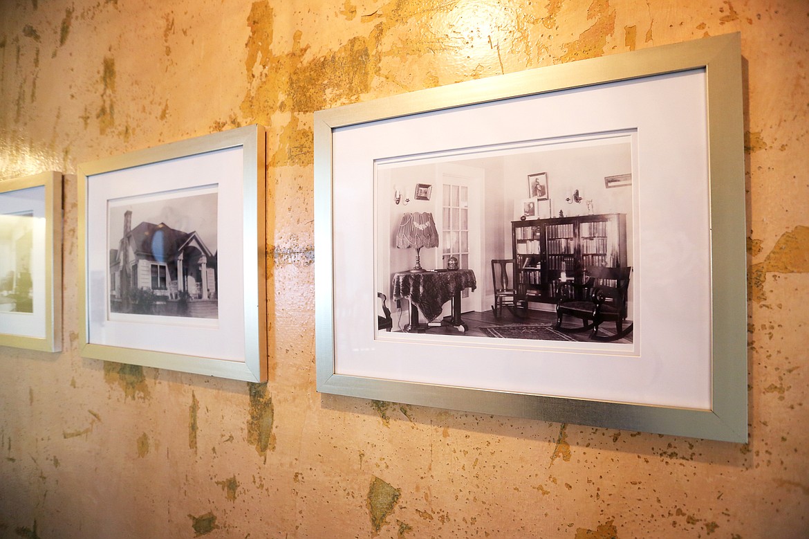 Vintage photographs of the Nelson&#146;s home from a found roll of undeveloped film are displayed in their hallway. (Mackenzie Reiss/Daily Inter Lake)