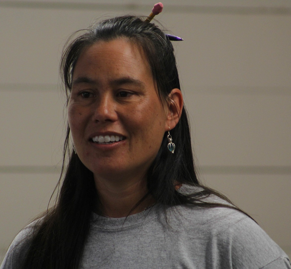 U.S. Forest Service archaeologist Erika Karuzas introduces the Passport in Time volunteers.