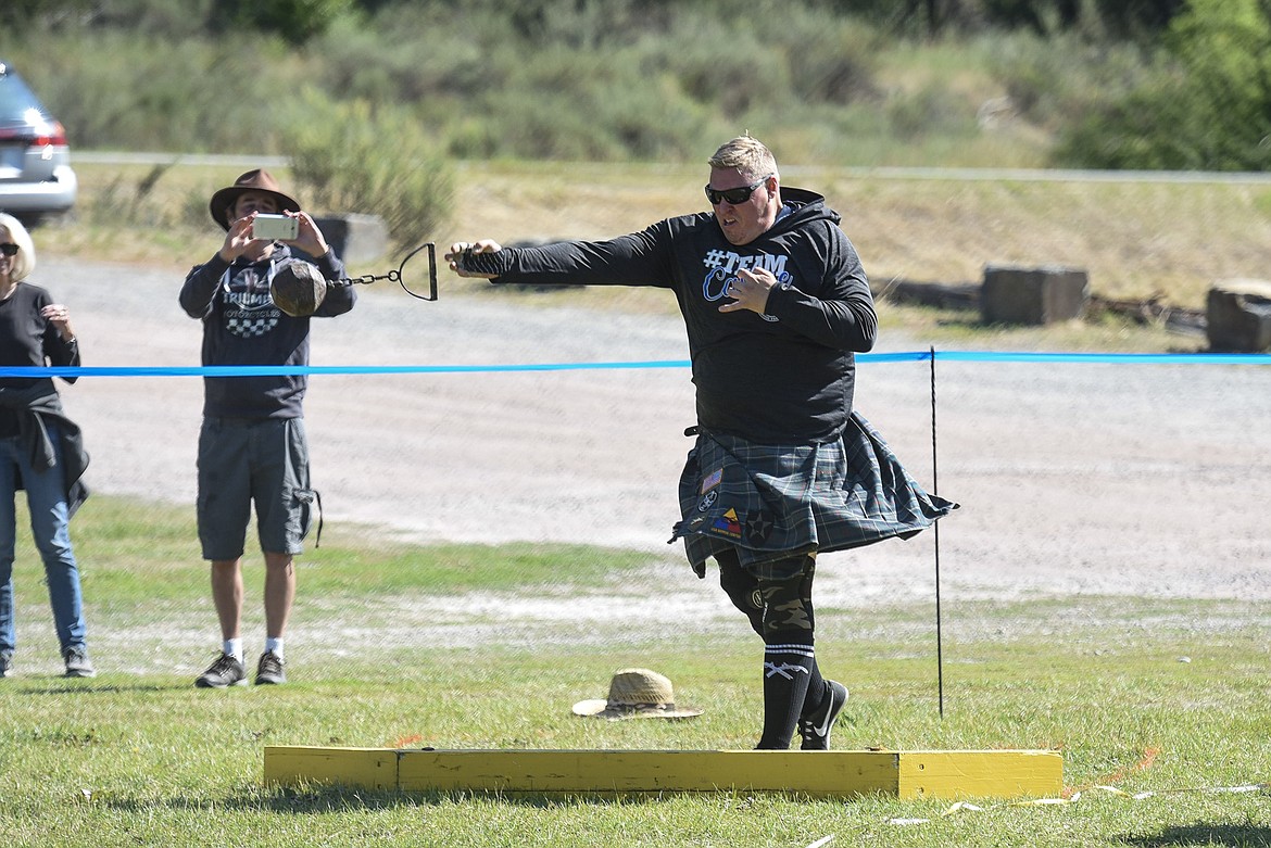 Tim Carlburg of Kalispell makes his throw during the weight-for-distance competition Saturday at the Kootenai Highland Gathering and Celtic Games. (Ben Kibbey/The Western News)