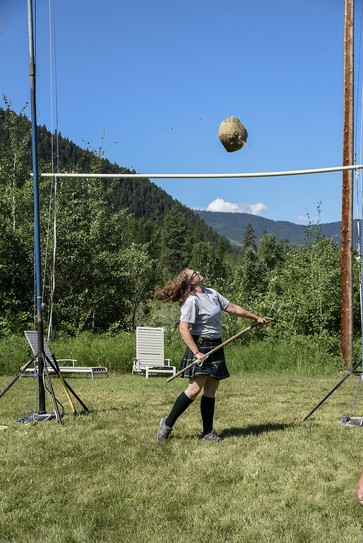 Kyle O'Neill, from Missoula, competes in the sheaf toss Saturday at the Kootenai Highland Gathering and Celtic Games. (Ben Kibbey/The Western News)