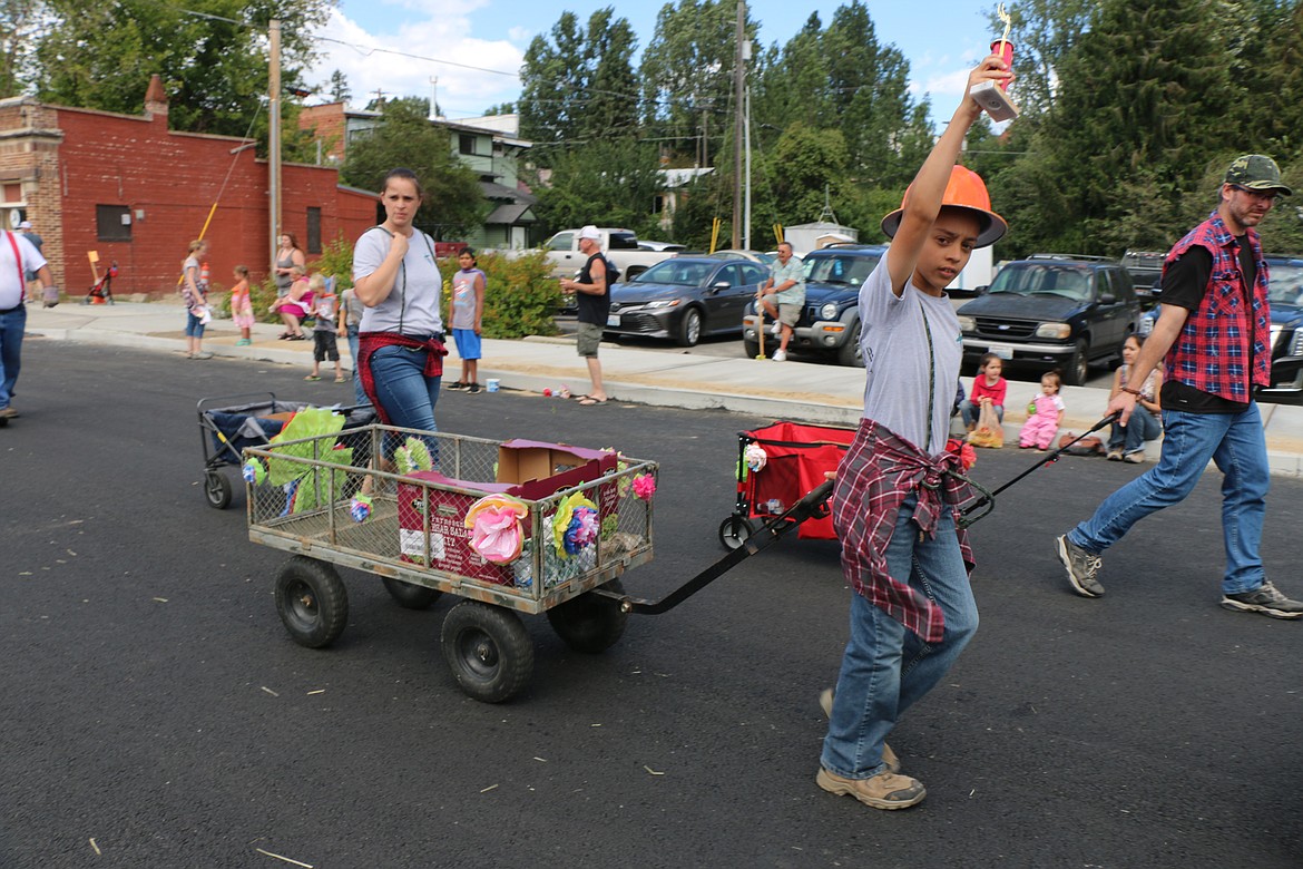 (Photo by CAROLINE LOBSINGER)
A parade participant shows off his Timber Days pride on Saturday.