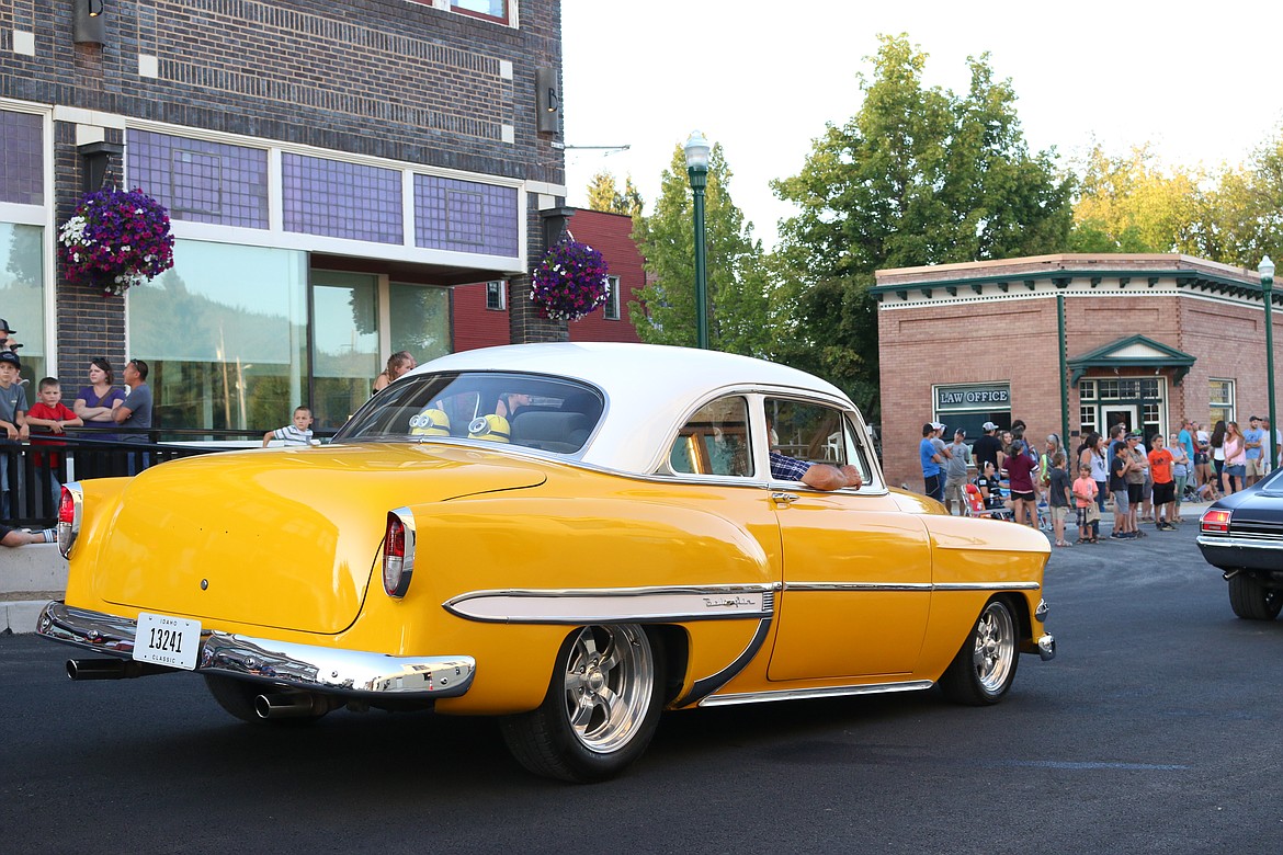 (Photo by MARY MALONE)
The crowds gathered in downtown Priest River Friday evening to enjoy the annual Asphalt Angels&#146; Hot Neon Nights Car Cruise.