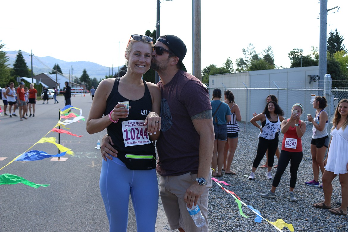 (Photo by MARY MALONE)
Hilary Hastings of Priest River got a big surprise as she crossed the Run for the Berries finish line on Saturday &#151; a diamond ring. Mike Davidson, of San Diego, Calif., was waiting for her when she finished her 8K run, asking her to marry him right there at the finish line. She said yes.