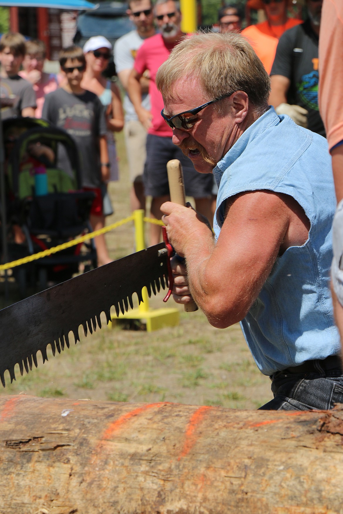 (Photo by CAROLINE LOBSINGER)
A logger competes in the Priest River Timber Days timber competition.