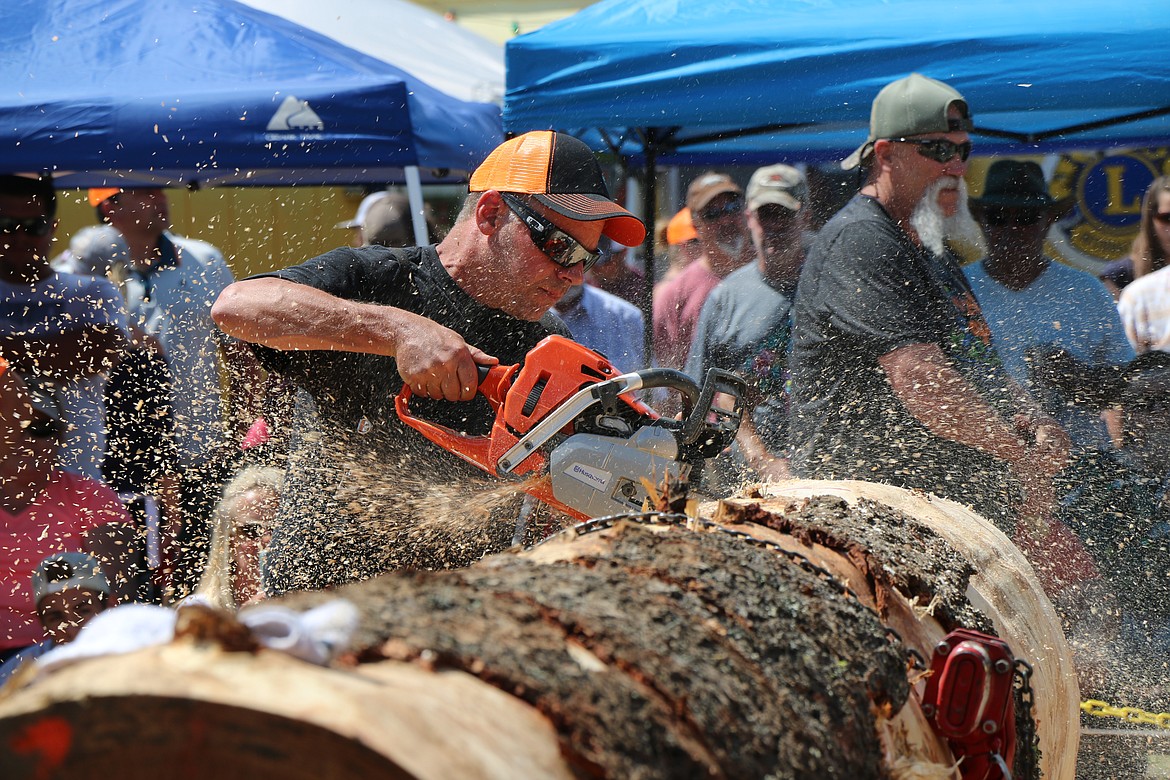 (Photo by CAROLINE LOBSINGER)
A logger competes in Saturday&#146;s Timber Days logging competition.