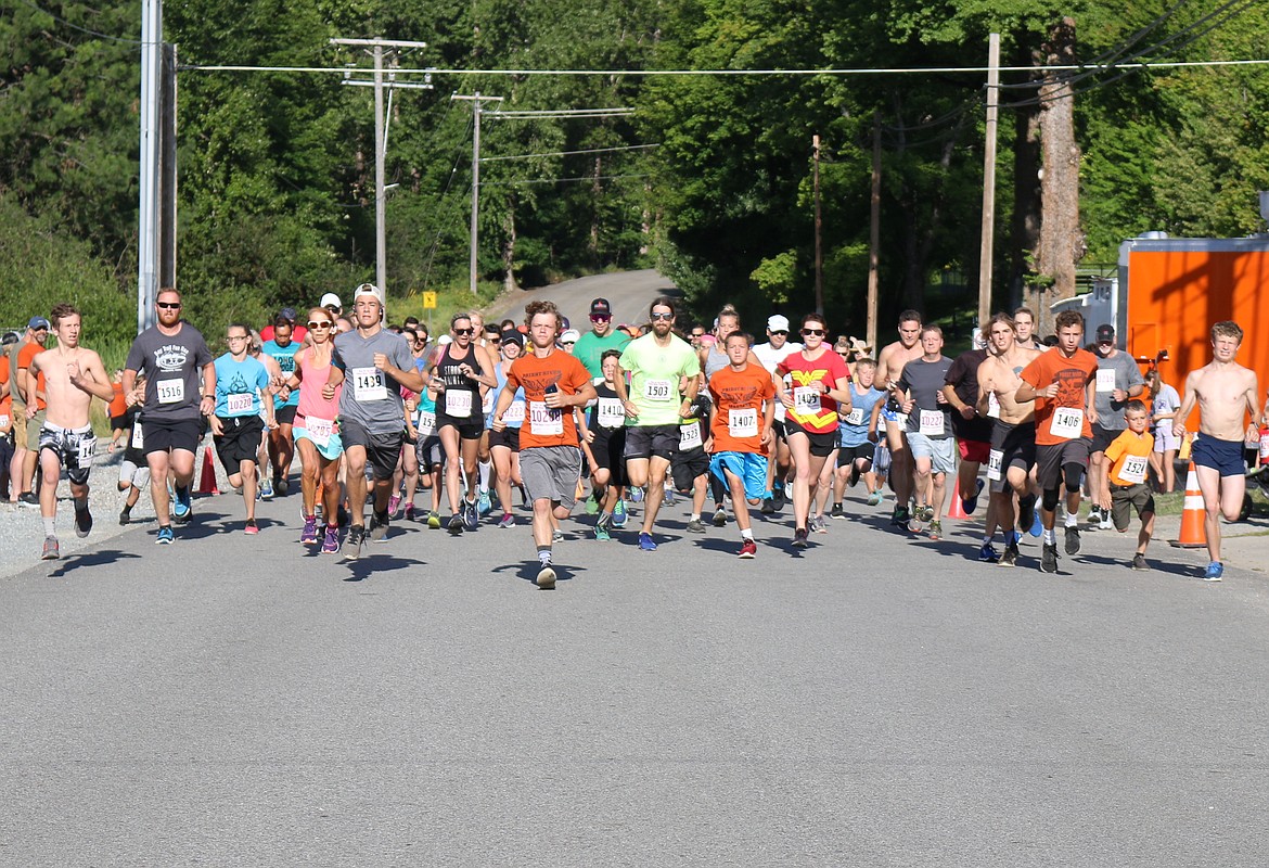 (Photo by MARY MALONE)
Run for the Berries participants begin their 5K and 8K races in Priest River on Saturday.