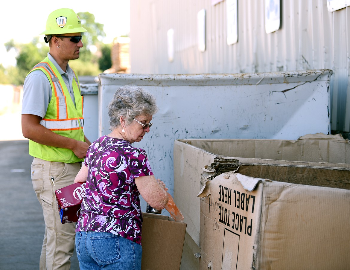Gloria Schmidt of Evergreen drops off some recycling at Pacific Steel and Recycling on Monday. (Brenda Ahearn photos/Daily Inter Lake)
