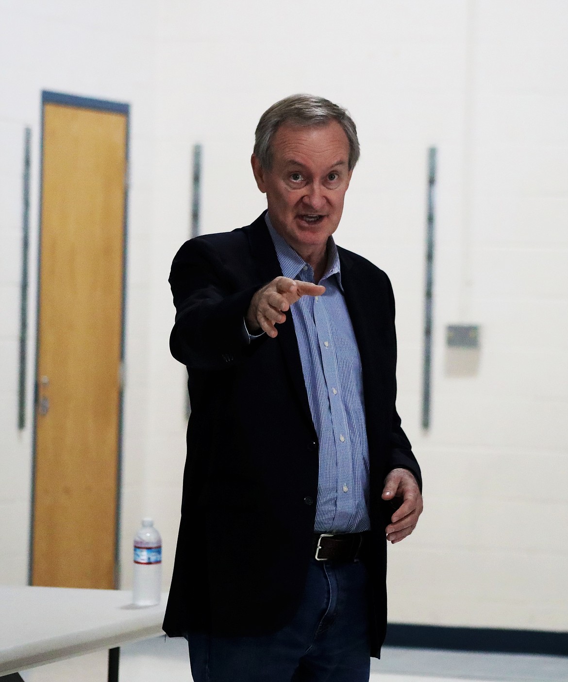 (Photo by KYLE CAJERO)
U.S. Sen. Mike Crapo, R-Idaho, gestures toward the crowd during a town hall at Sagle Elementary School on Aug. 7.