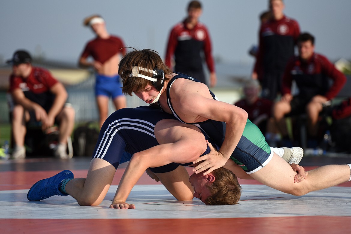 Glacier High School&#146;s Bridger Beach (132 lbs.), top, wrestles Baden-W&uuml;rttemberg&#146;s Nils Krautsieder (130 lbs.) at Legends Stadium on Wednesday. (Casey Kreider/Daily Inter Lake)