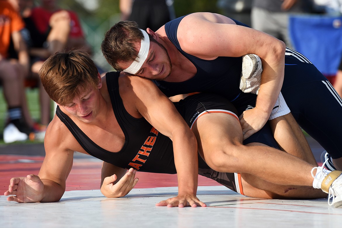 Flathead High School&#146;s Paxton Boyce (180 lbs.), left, wrestles Baden-W&uuml;rttemberg&#146;s Marcus King (183 lbs.) at Legends Stadium on Wednesday. (Casey Kreider/Daily Inter Lake)