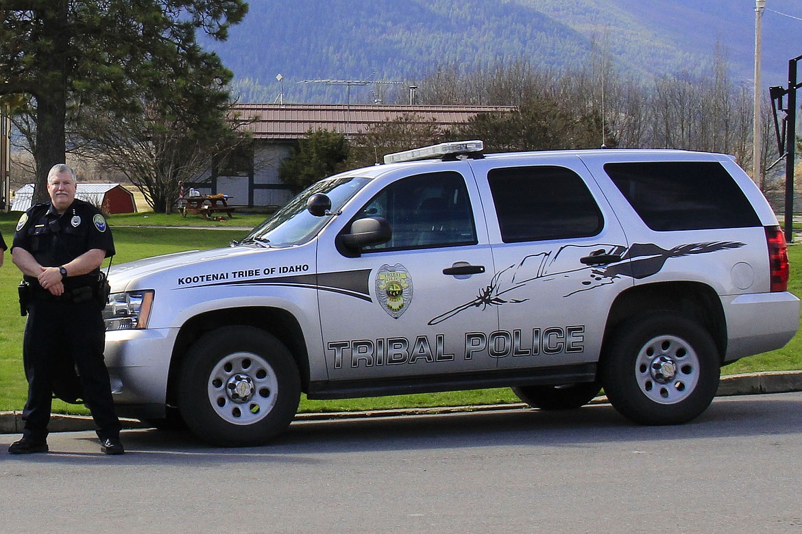 (Courtesy Photo)
Former Kootenai Tribe of Idaho Chief of Police Joel Minor with his patrol vehicle.