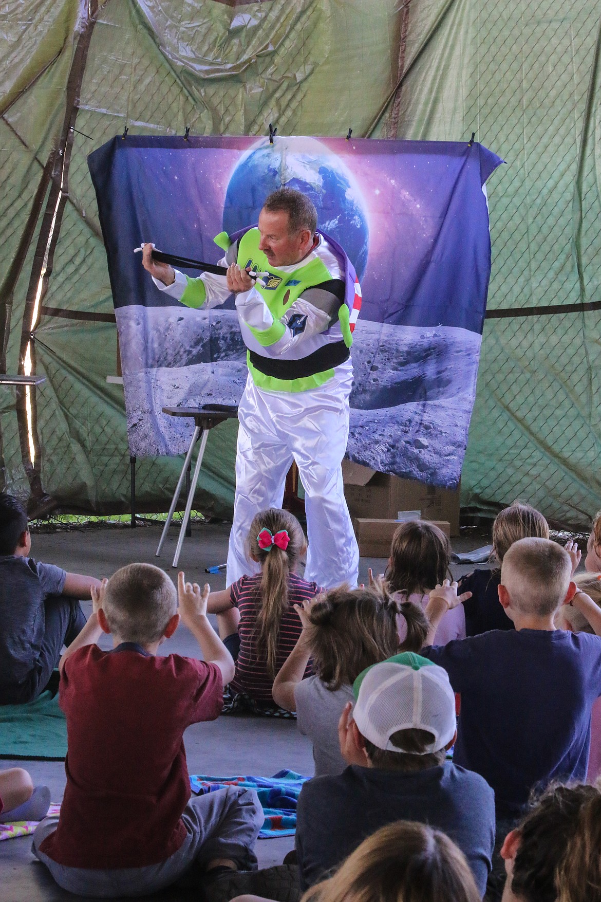 Photo by MANDI BATEMAN
Despite gusts of wind, Dave the Magic Man thrilled the children at the Boundary County Fairgrounds.