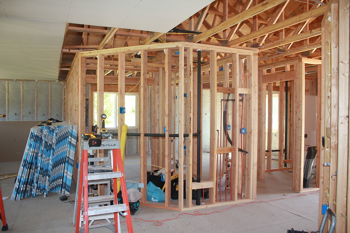 Photo by TANNA YEOUMANS
A portion of the inside of the house, depicting tow bedrooms and a bathroom with the living room on the left hand side.