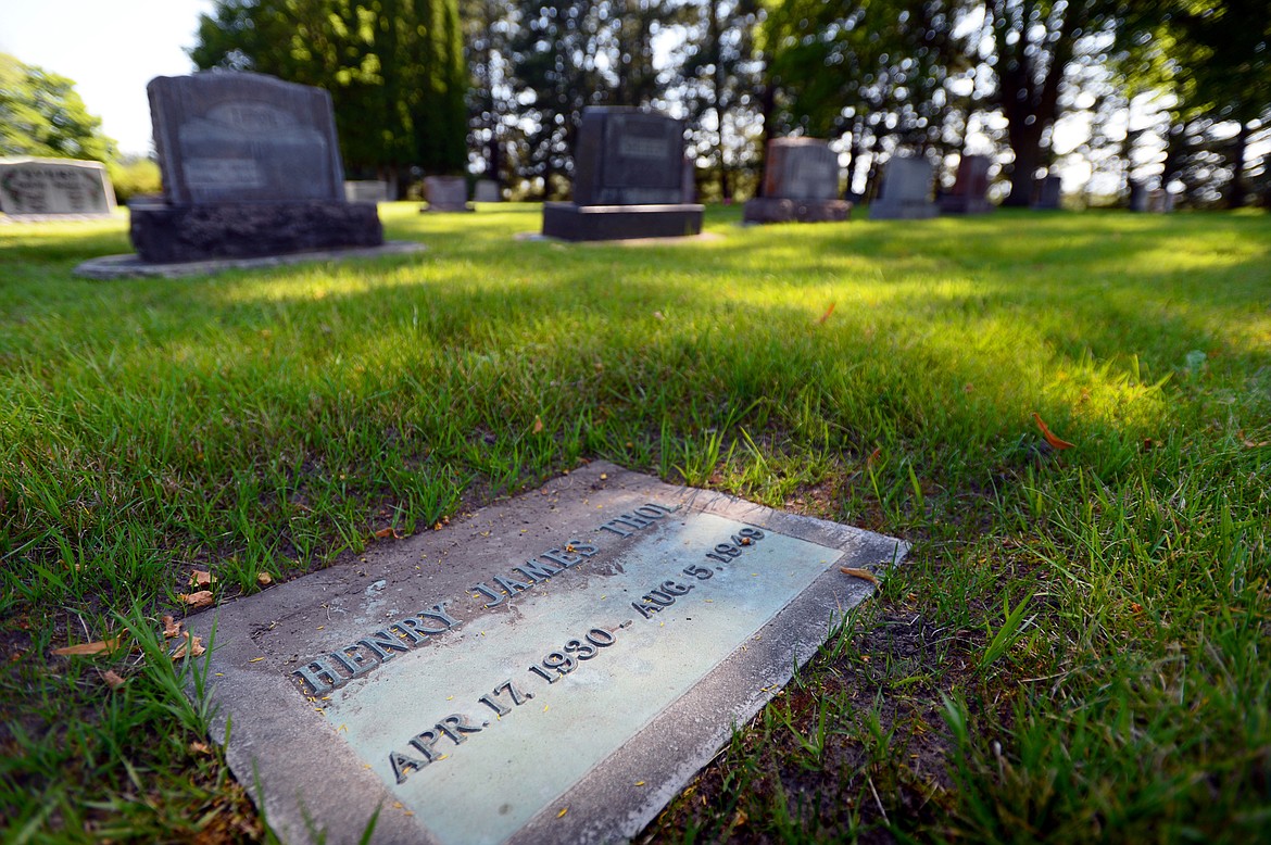 The gravestone of Henry James Thol Jr. at C.E. Conrad Memorial Cemetery in Kalispell on Thursday, Aug. 1. (Casey Kreider/Daily Inter Lake)