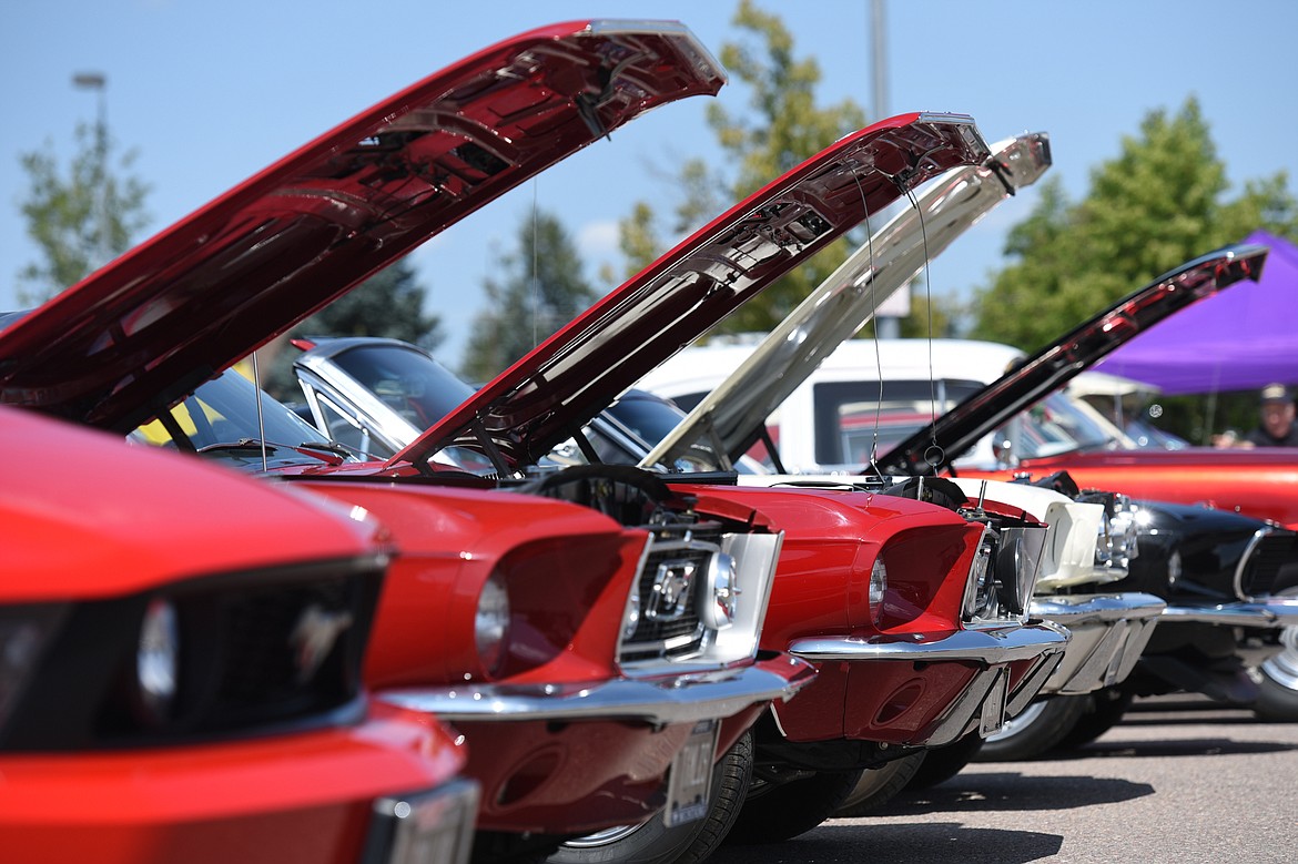 A row of Ford Mustangs on display at the Evergreen Show &#145;n Shine at Conlin&#146;s Furniture in Evergreen on Saturday. (Casey Kreider/Daily Inter Lake)