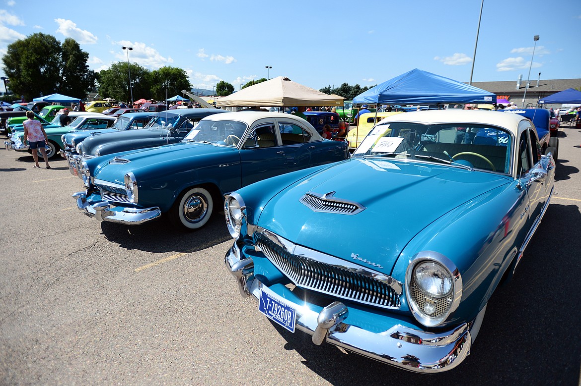 A pair of 1954 Kaiser Specials at the Evergreen Show &#145;n Shine at Conlin&#146;s Furniture in Evergreen on Saturday. (Casey Kreider/Daily Inter Lake)
