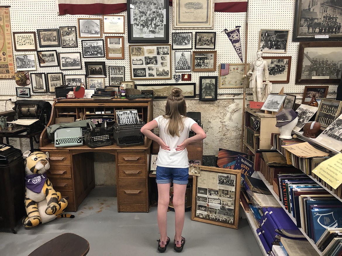 Kloe takes in several pictures from Mullan&#146;s past.