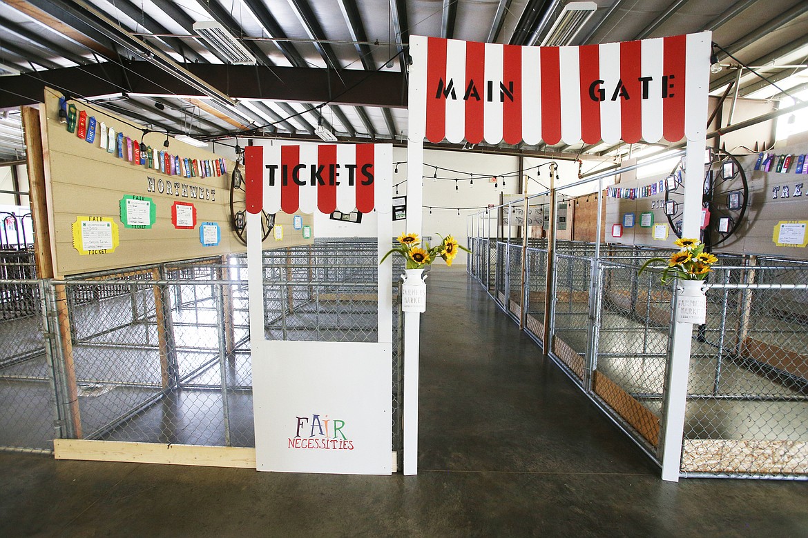 A number of 4-H kids have arrived early at the Kootenai County Fairgrounds to decorate their stalls before the North Idaho State Fair. (LOREN BENOIT/Press)