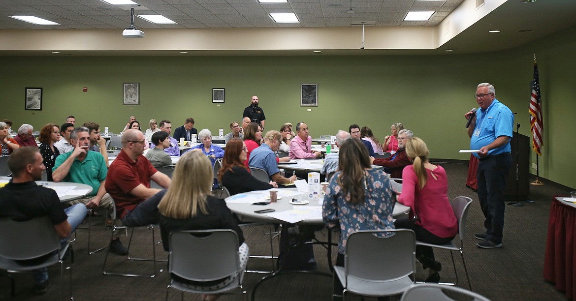 Coeur d'Alene Chamber of Commerce President Steve Wilson shares what was discussed during round table sessions he participated in Wednesday during the Missing Middle Housing Forum. (DEVIN WEEKS/Press)