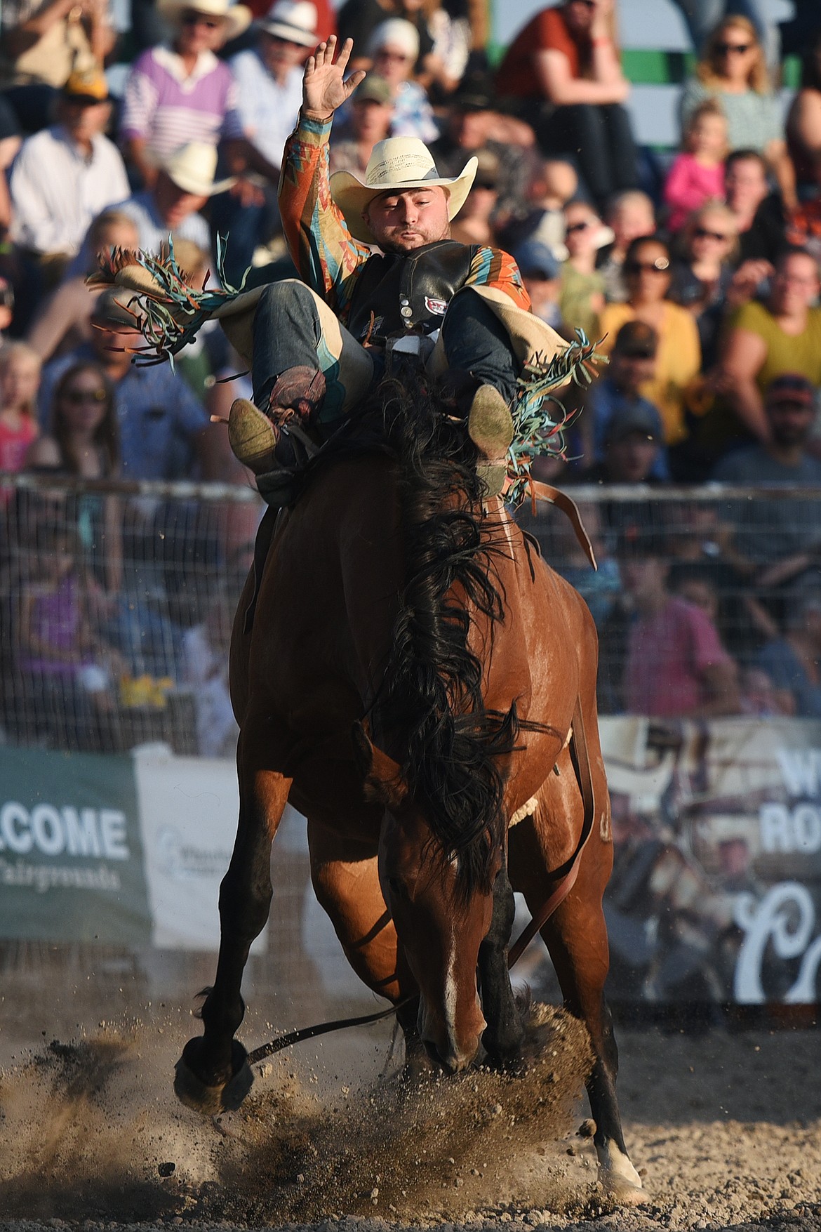 Tristan Hanson hangs on to his horse Grid Rock in bareback riding at the Ram PRCA Rodeo at the Northwest Montana Fair &amp; Rodeo on Thursday. (Casey Kreider/Daily Inter Lake)