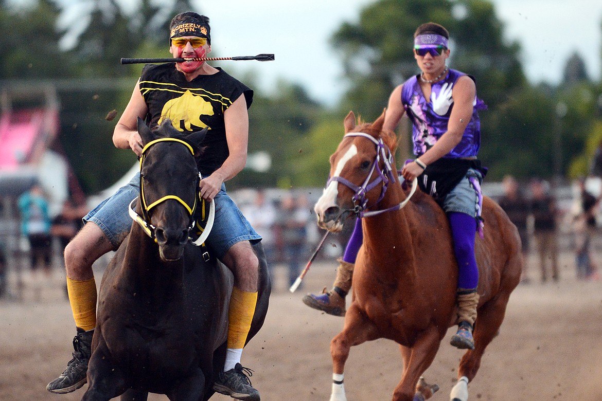 Riders compete in the Indian Relay Races at the Northwest Montana Fair PRCA Rodeo at the Flathead County Fairgrounds on Saturday. (Casey Kreider/Daily Inter Lake)