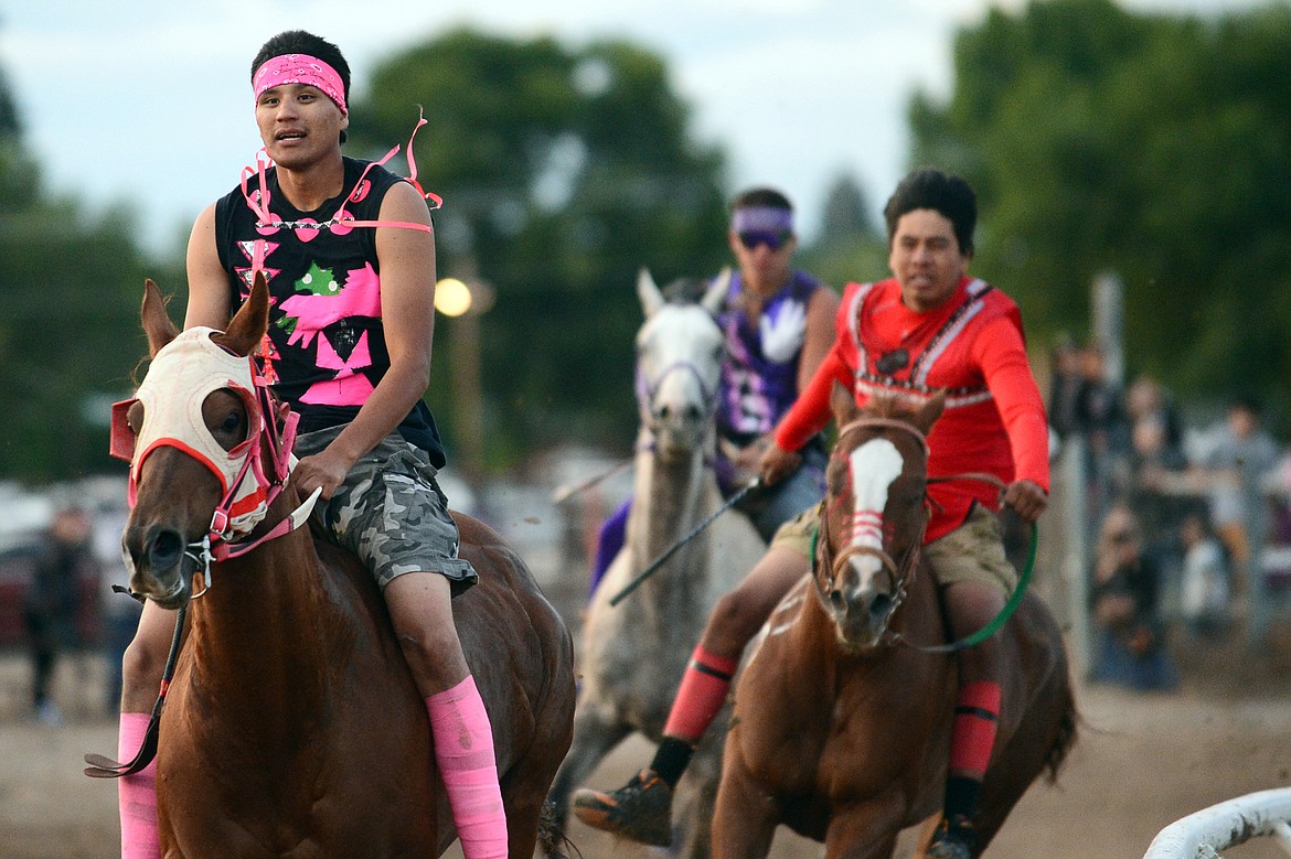 Riders compete in the Indian Relay Races at the Northwest Montana Fair PRCA Rodeo at the Flathead County Fairgrounds on Saturday. (Casey Kreider/Daily Inter Lake)
