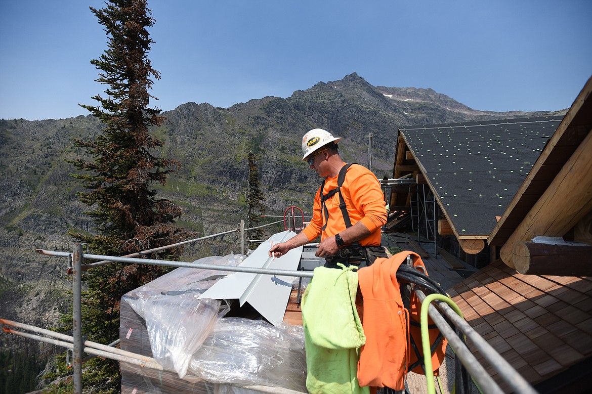 Project superintendent Rob Terrio, with Dick Anderson Construction, works on the upper level of the Sperry Chalet building in Glacier National Park on Thursday, Aug. 8. (Casey Kreider/Daily Inter Lake)