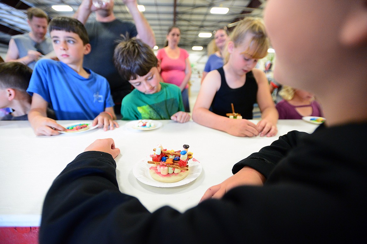 Kids wait for their cookie creations to be judged at the Crafty Cookie Contest at the Northwest Montana Fair &amp; Rodeo on Thursday. (Casey Kreider/Daily Inter Lake)