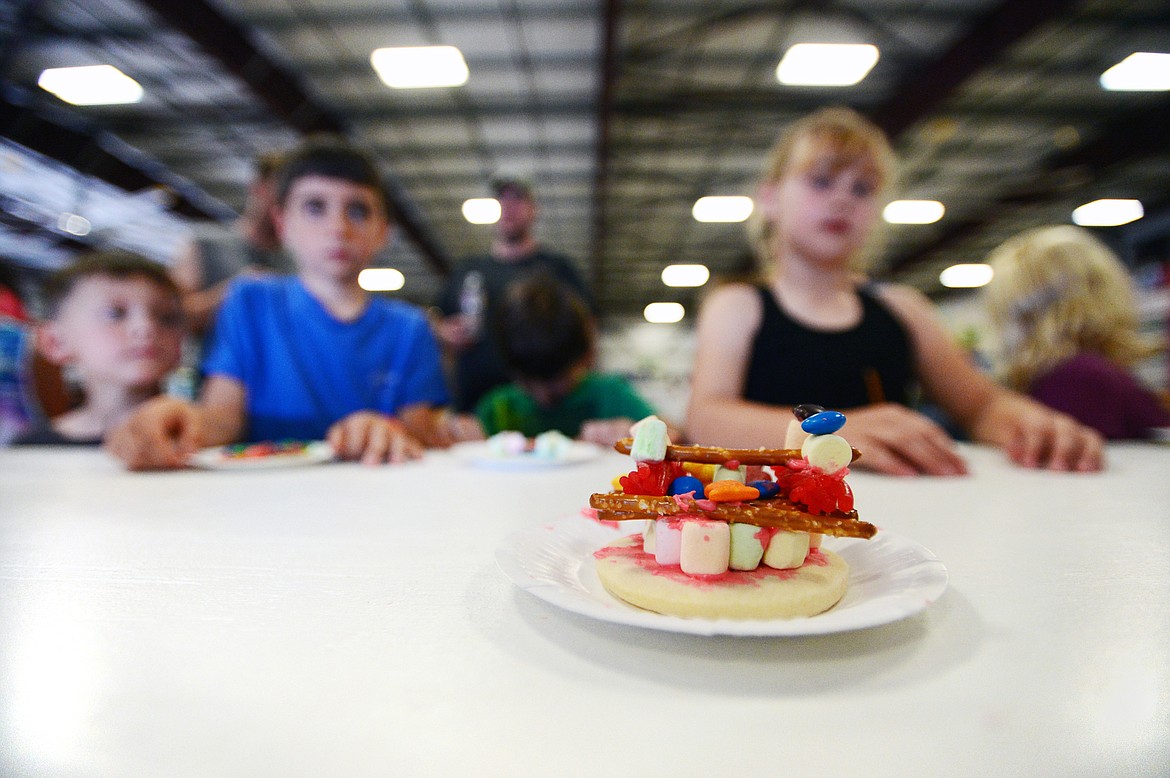 Kids wait for their cookie creations to be judged at the Crafty Cookie Contest at the Northwest Montana Fair &amp; Rodeo on Thursday. (Casey Kreider/Daily Inter Lake)