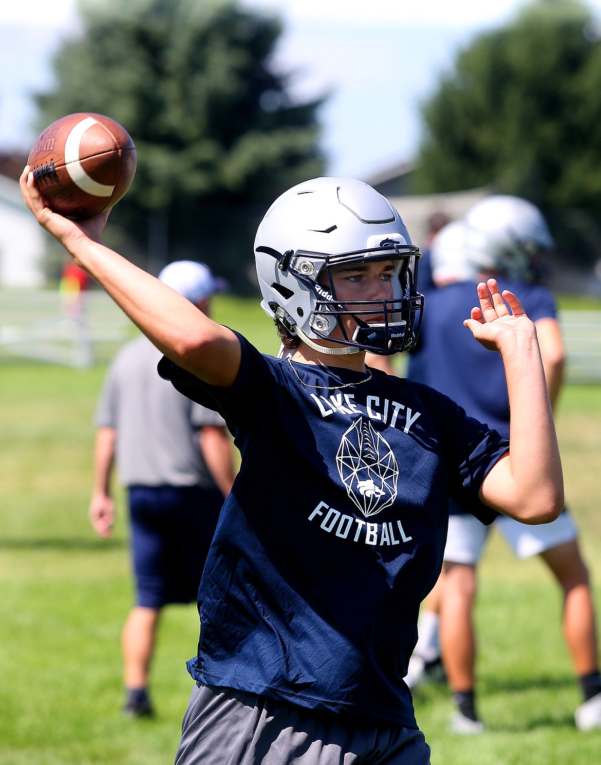 Junior Aiden Fink throws to a receiver during practice Tuesday at Lake City High School.