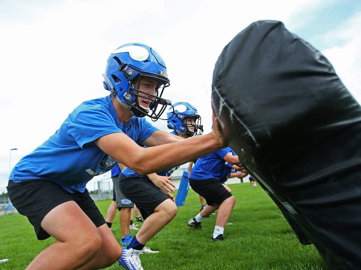 Sophomore Aiden Myers participates in lineman drills during the first day of practice Monday at Coeur d&#146;Alene High School. (LOREN BENOIT/Press)