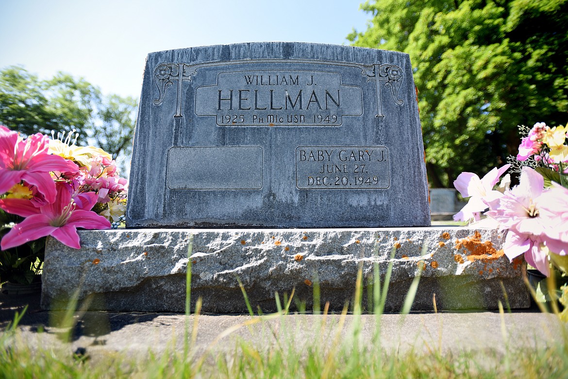 The gravestone of William James Hellman at C.E. Conrad Memorial Cemetery in Kalispell on Thursday, Aug. 1. (Casey Kreider/Daily Inter Lake)