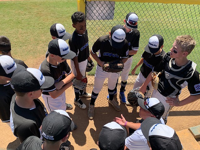 KALE FENTER/Special to the Press
Coeur d&#146;Alene Little League manager Robin Franklin addresses his team following the top of the sixth inning of Saturday&#146;s Northwest Regional championship game in San Bernardino, Calif.