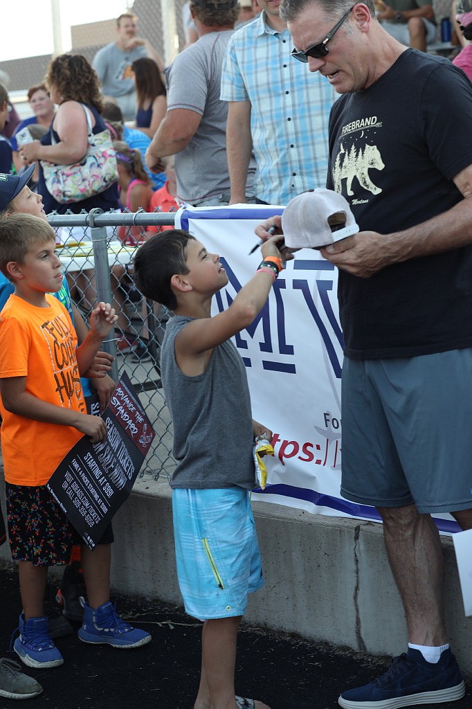 FORMER OAKLAND Raiders, and Los Angeles Raiders lineman Howie Long signs autographs for Mission Valley fans, as he was one of the key guest speakers in the upcoming flag football league slated to start in September. (photo courtesy of Susan Lake)