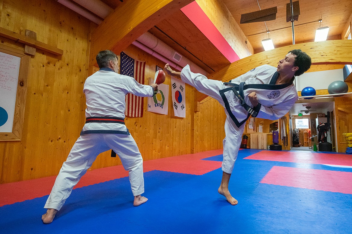 Tanner Armstrong practices with Andrew Hamer at Sawbuck Do Jang in Whitefish. (Daniel McKay/Whitefish Pilot)