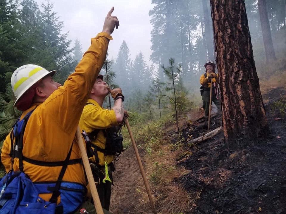 Photo by NORTH BENCH FIRE
North Bench Firefighters work to extinguish a wildfire started by a lightning strike.