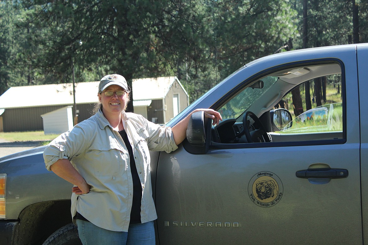 LOCAL BEAR expert for Western Montana, Kim Annis standing next to her truck which is always loaded with fencing gear and supplies to keep the bears at bay. (John Dowd/Clark Fork Valley Press)