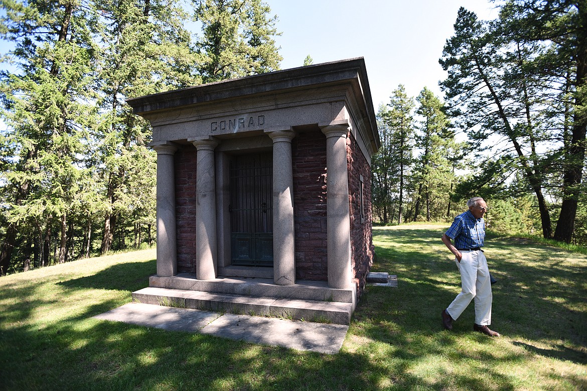 Korn walks by the Conrad Memorial Cemetery&#146;s mausoleum.