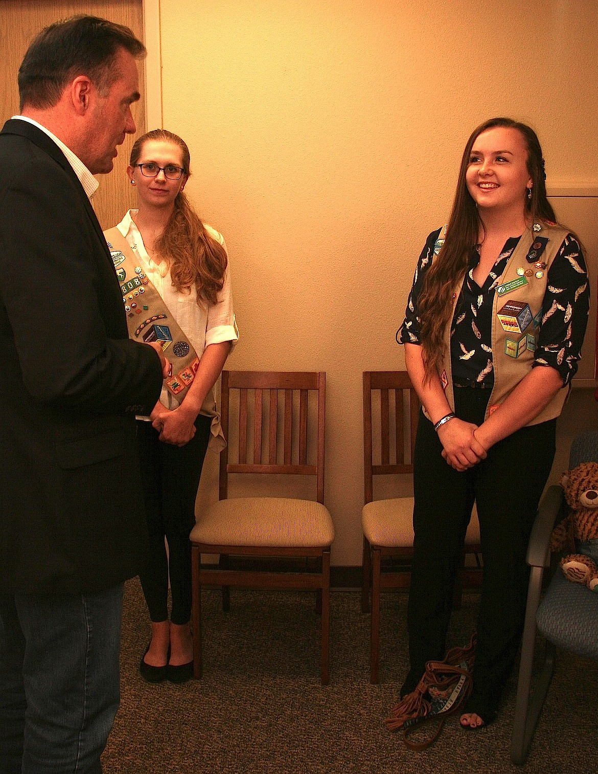 (BRIAN WALKER/Hagadone News Network)
Rep. Russ Fulcher, R-Idaho, visits with Girl Scouts Caitlyn Smith, middle, and Jacquelyn Duncan on Thursday at Fulcher&#146;s office in Coeur d&#146;Alene.