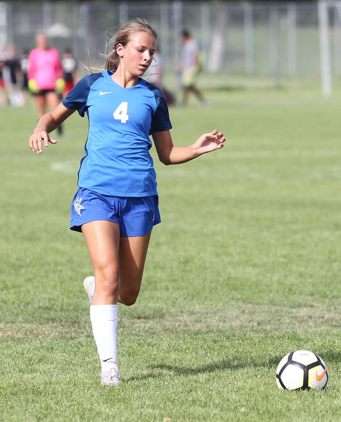 JASON ELLIOTT/Press
Coeur d&#146;Alene junior McKenzie Mattis runs down the ball during the second half of Wednesday&#146;s YEA Jamboree match with Sandpoint.