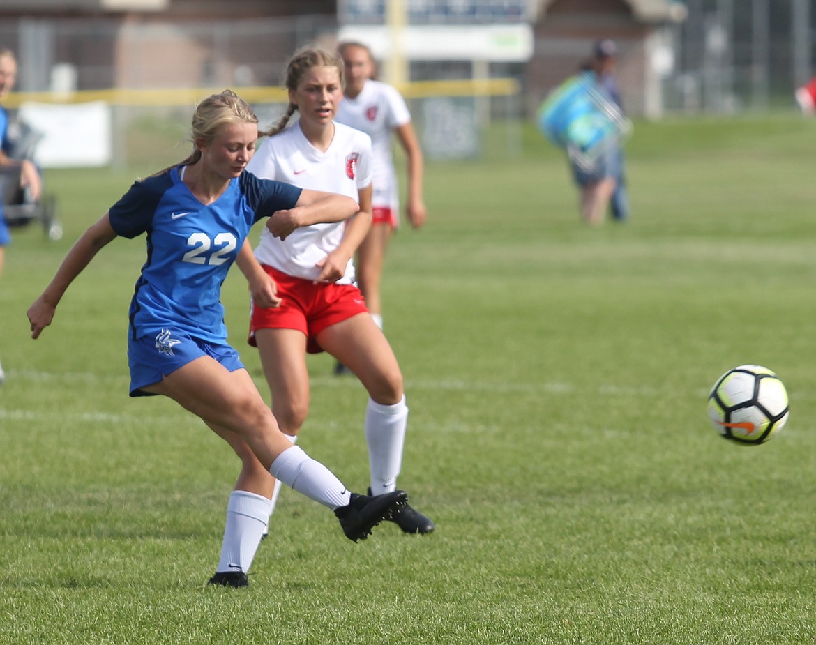 JASON ELLIOTT/Press
Coeur d&#146;Alene sophomore Olivia Wyatt passes the ball to a teammate during a match with Sandpoint in the YEA Jamboree at the Irma Anderl Soccer Complex on Wednesday.