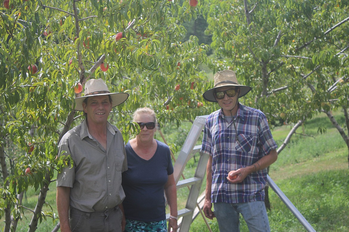 Photos by TANNA YEOUMANS
The crew at Points North Orchard: Larry and Robin Lammers and their friend and worker, Jake.