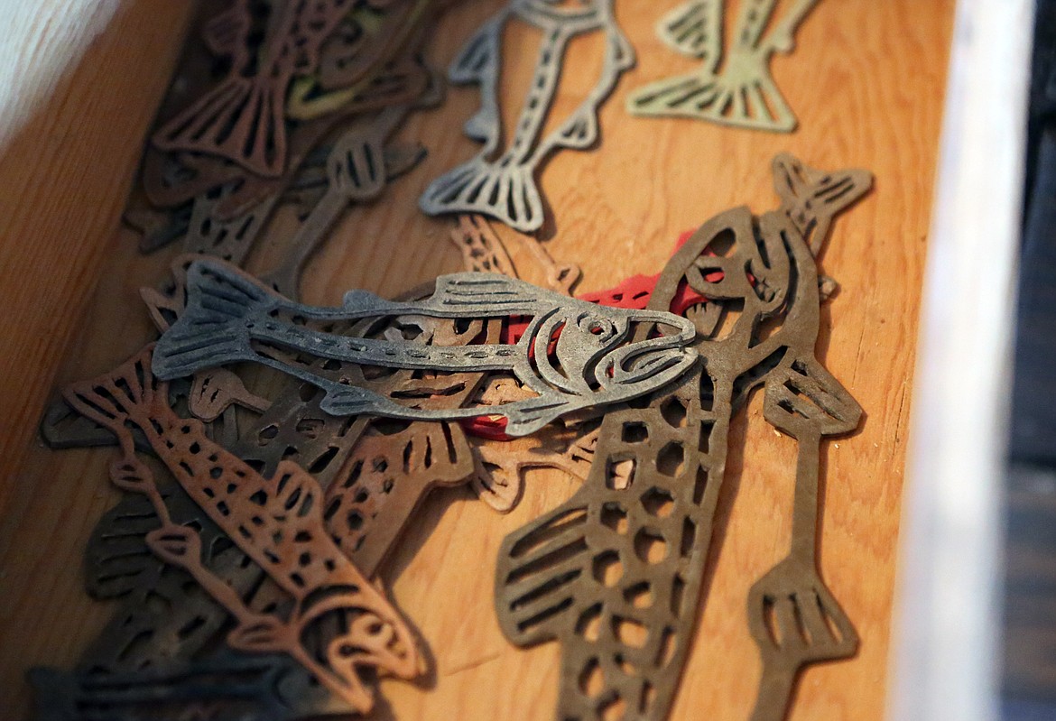 Fish stencils fill a drawer at Casey Fuson&#146;s pottery studio. She purchased the business from longtime owner, Karin Lamb in early 2019 and uses many of Lamb&#146;s designs as well as her own. (Mackenzie Reiss/Daily Inter Lake)